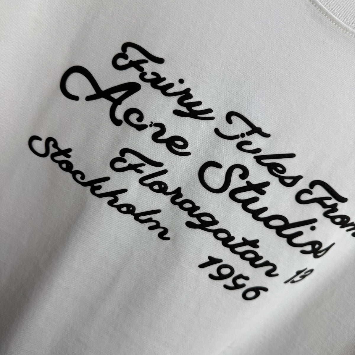 Acne Studios Fairy‑Tales Cursive‑Text Distressed‑Trim Crew‑Neck Short‑Sleeve T‑Shirt